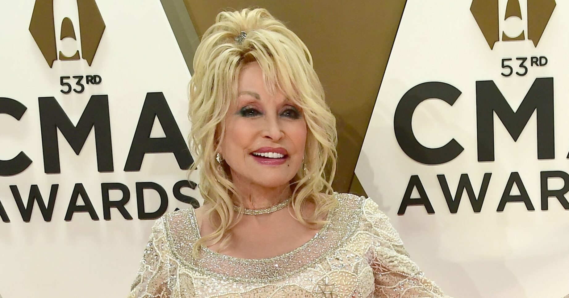Dolly Parton smiling at event