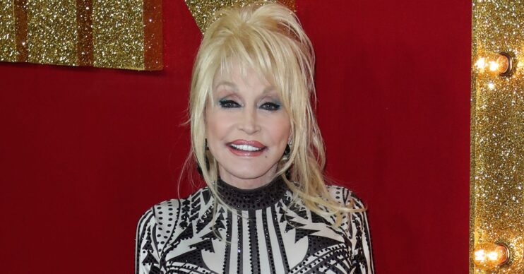 Dolly Parton smiling at event