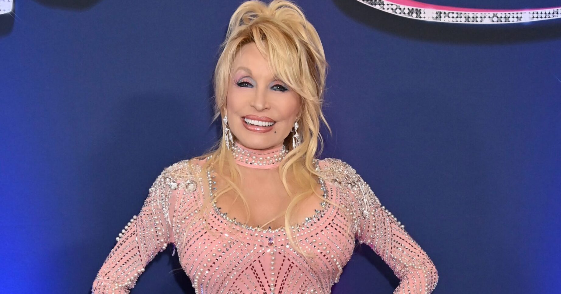 Dolly Parton in a pink dress