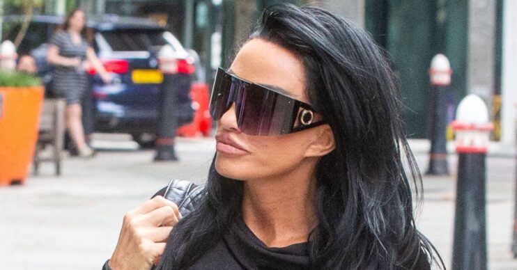 Katie Price wears sunglasses