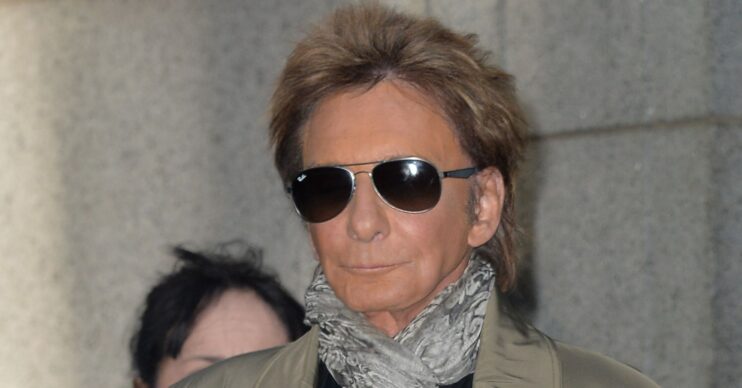Barry Manilow walking