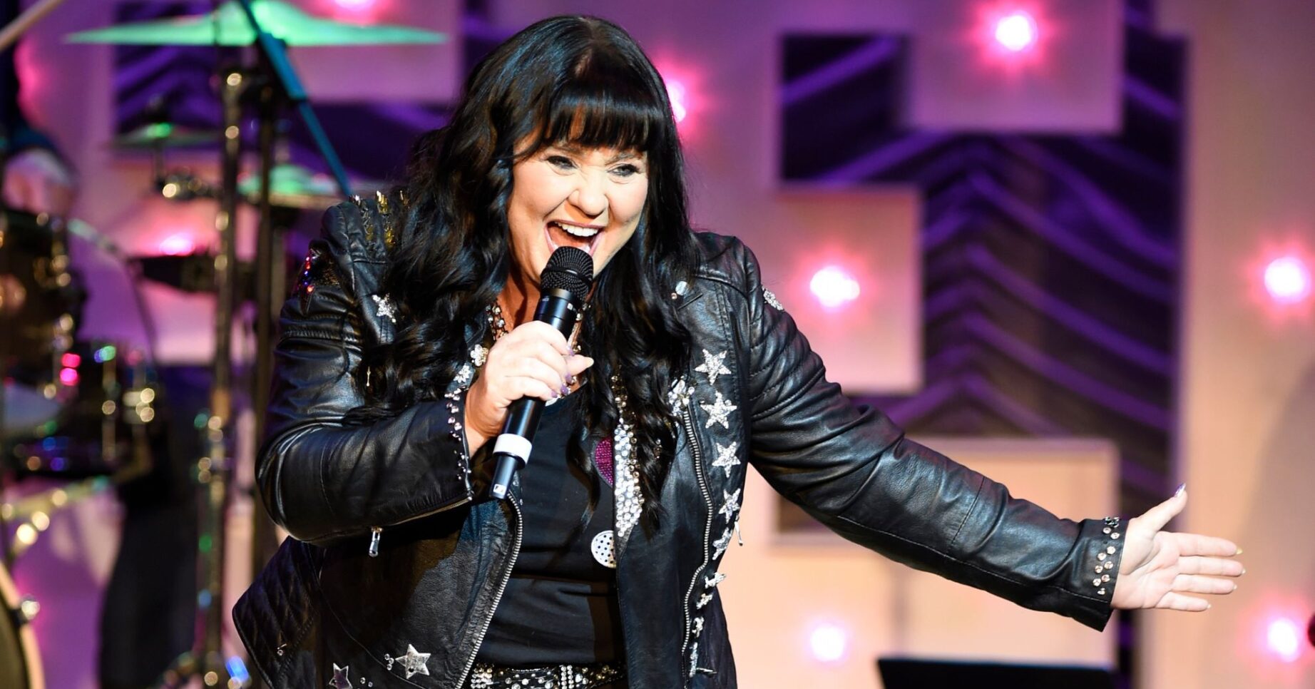 Coleen Nolan performing on stage