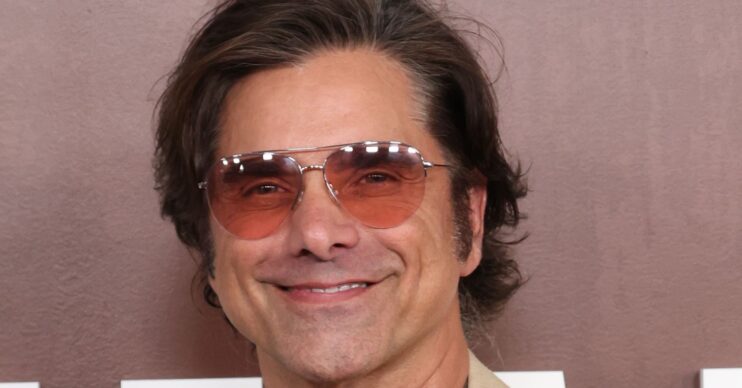 John Stamos smiling