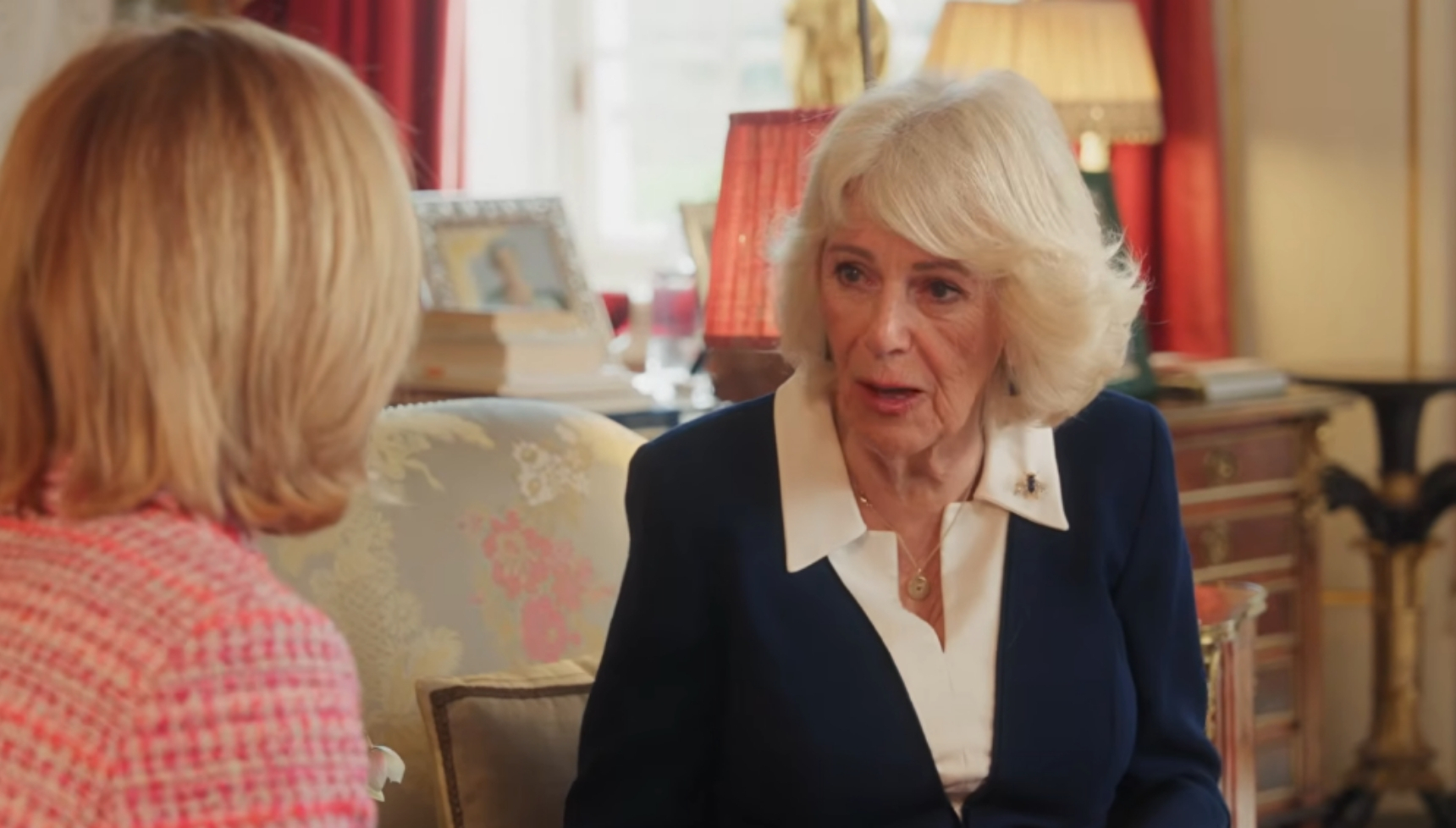 Queen Camilla talking to Dame Laura Lee 