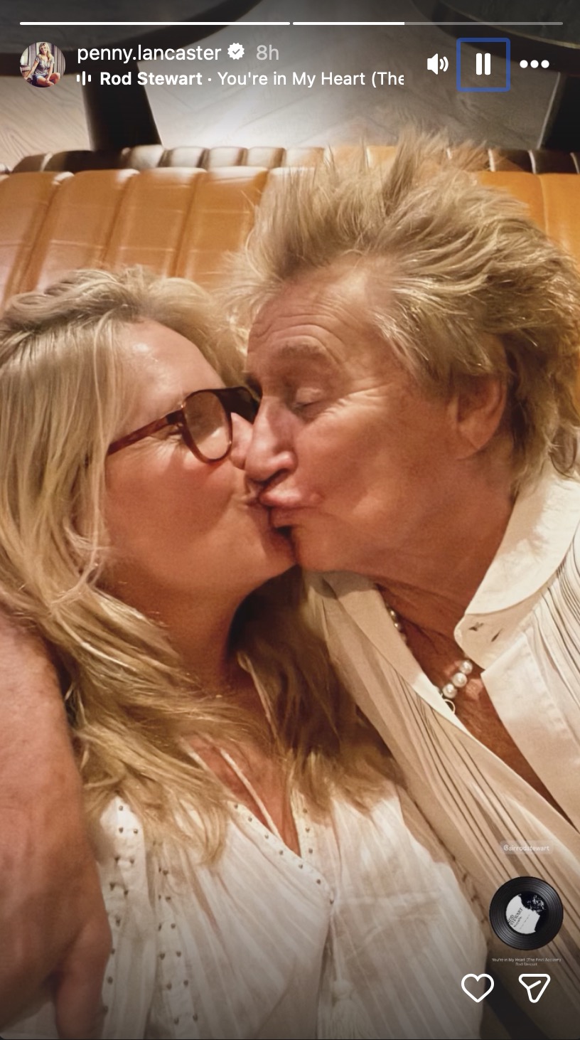Penny Lancaster and Rod Stewart kissing