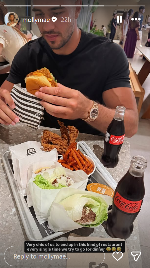 Tommy Fury eating a burger on Molly-Mae Hague's Instagram