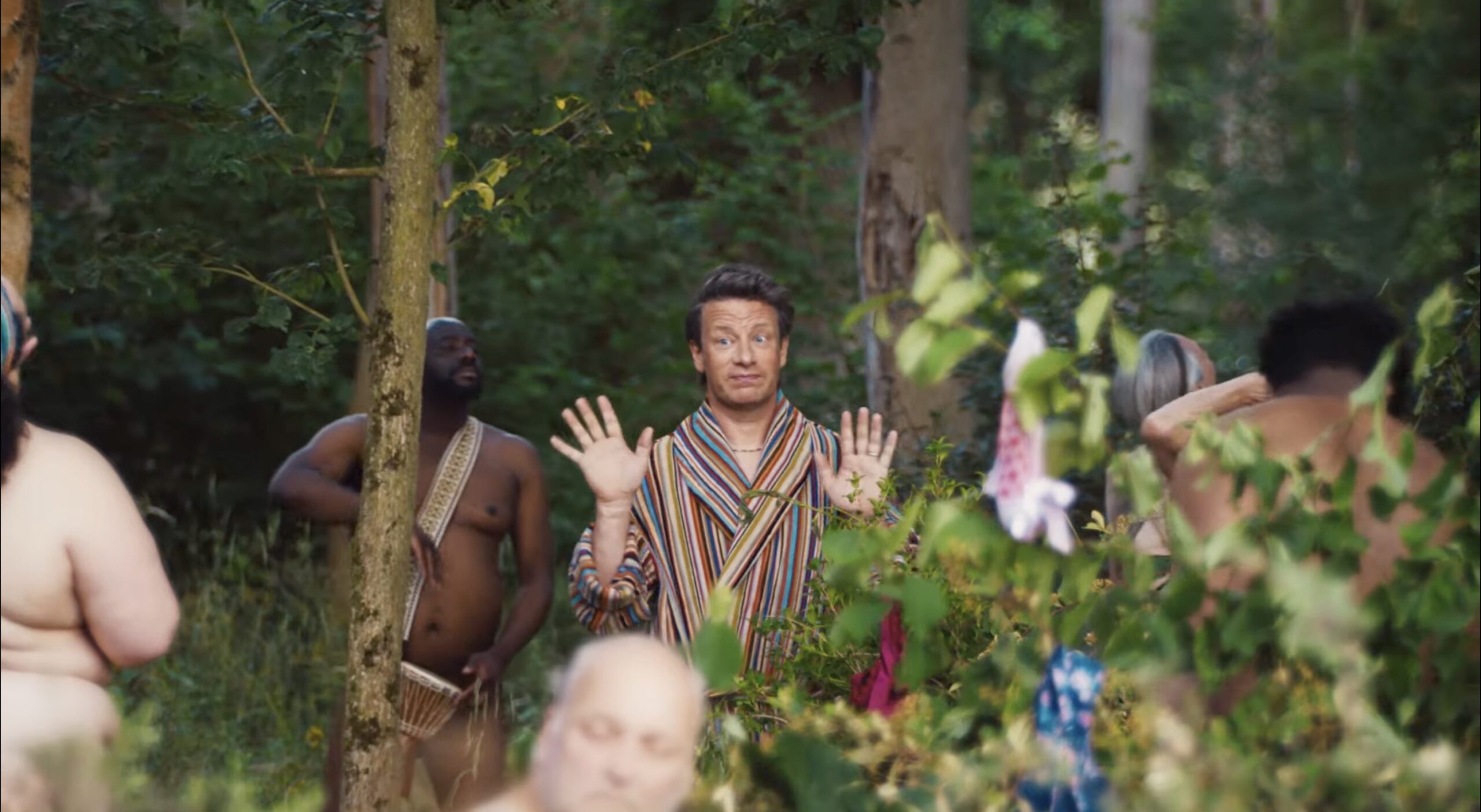 Jamie Oliver in the woods in a robe