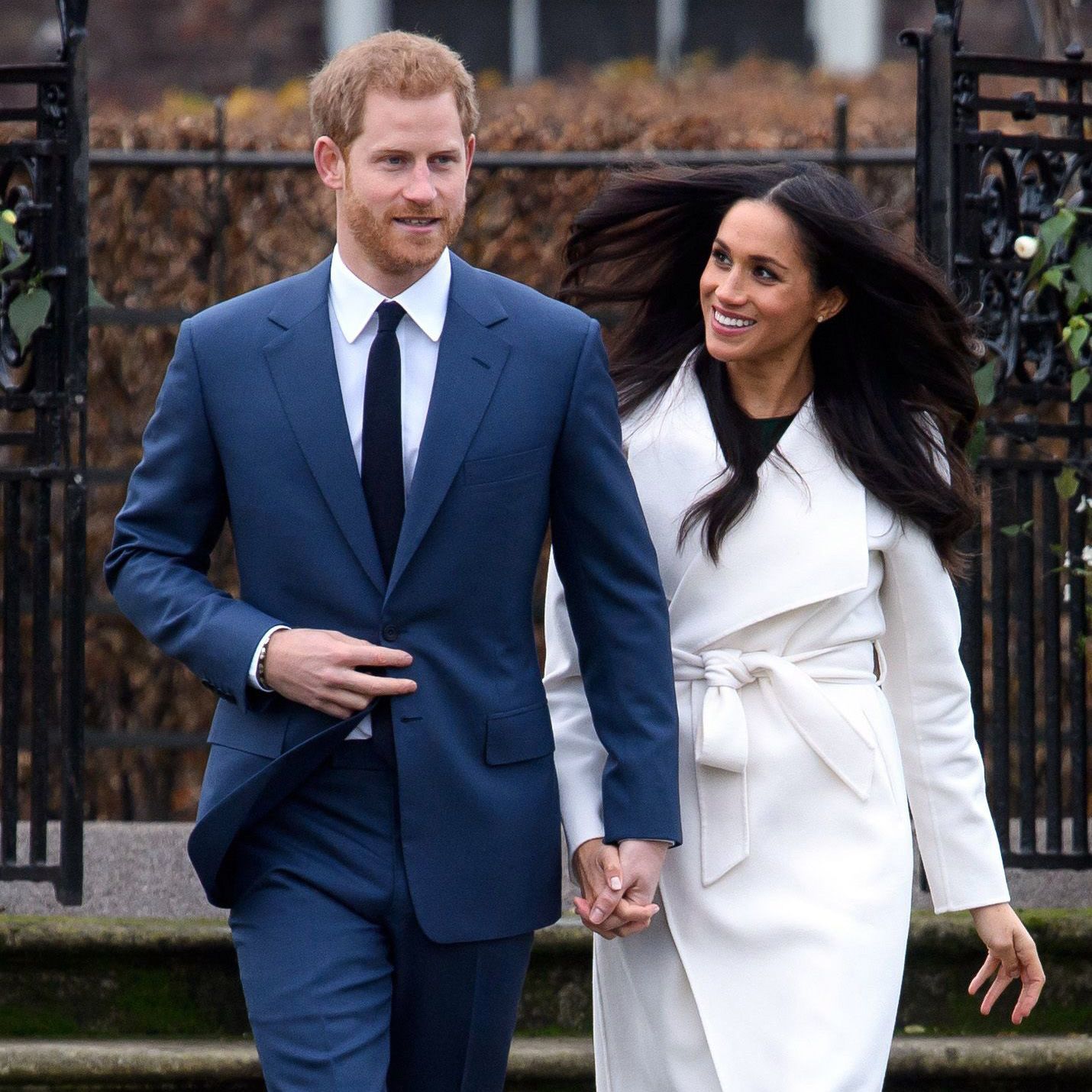 Prince Harry and Meghan walk alongside each other on day they announced engagement to the world