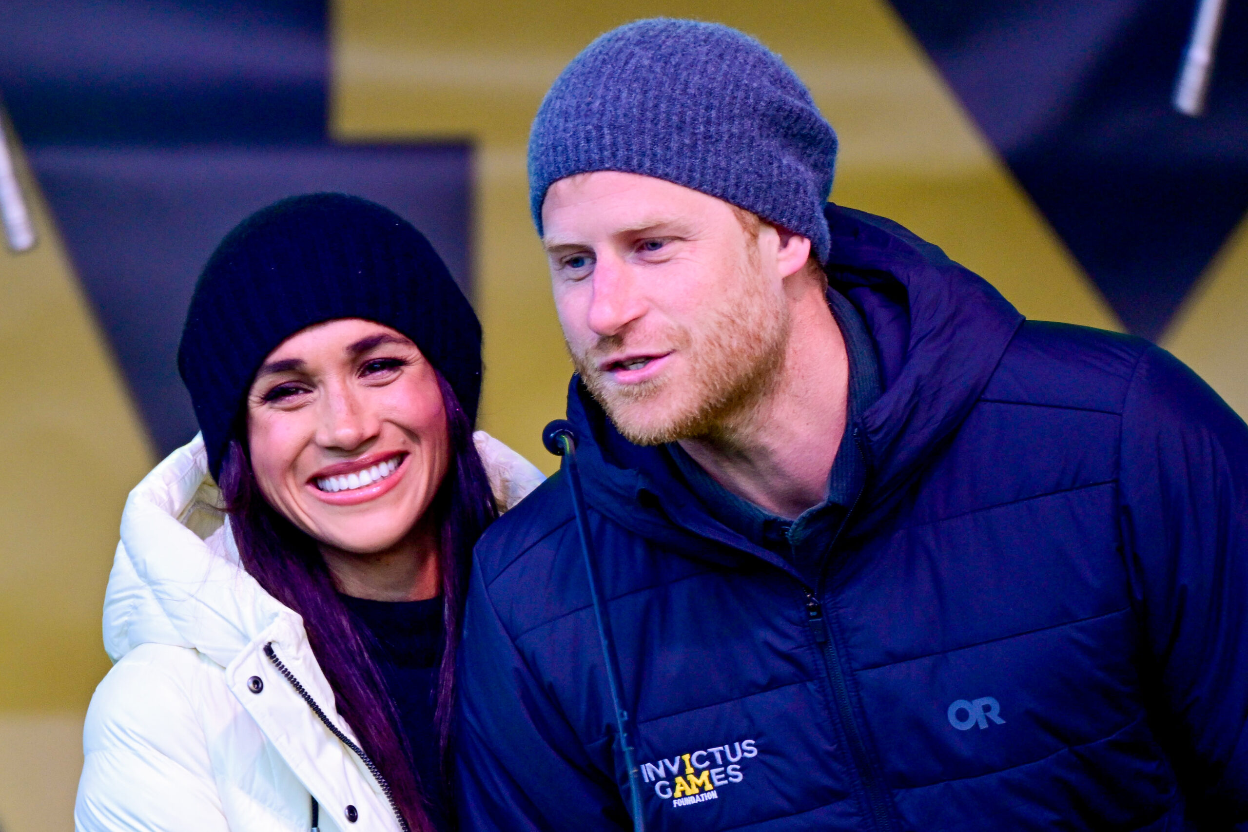 Prince Harry and Meghan smile