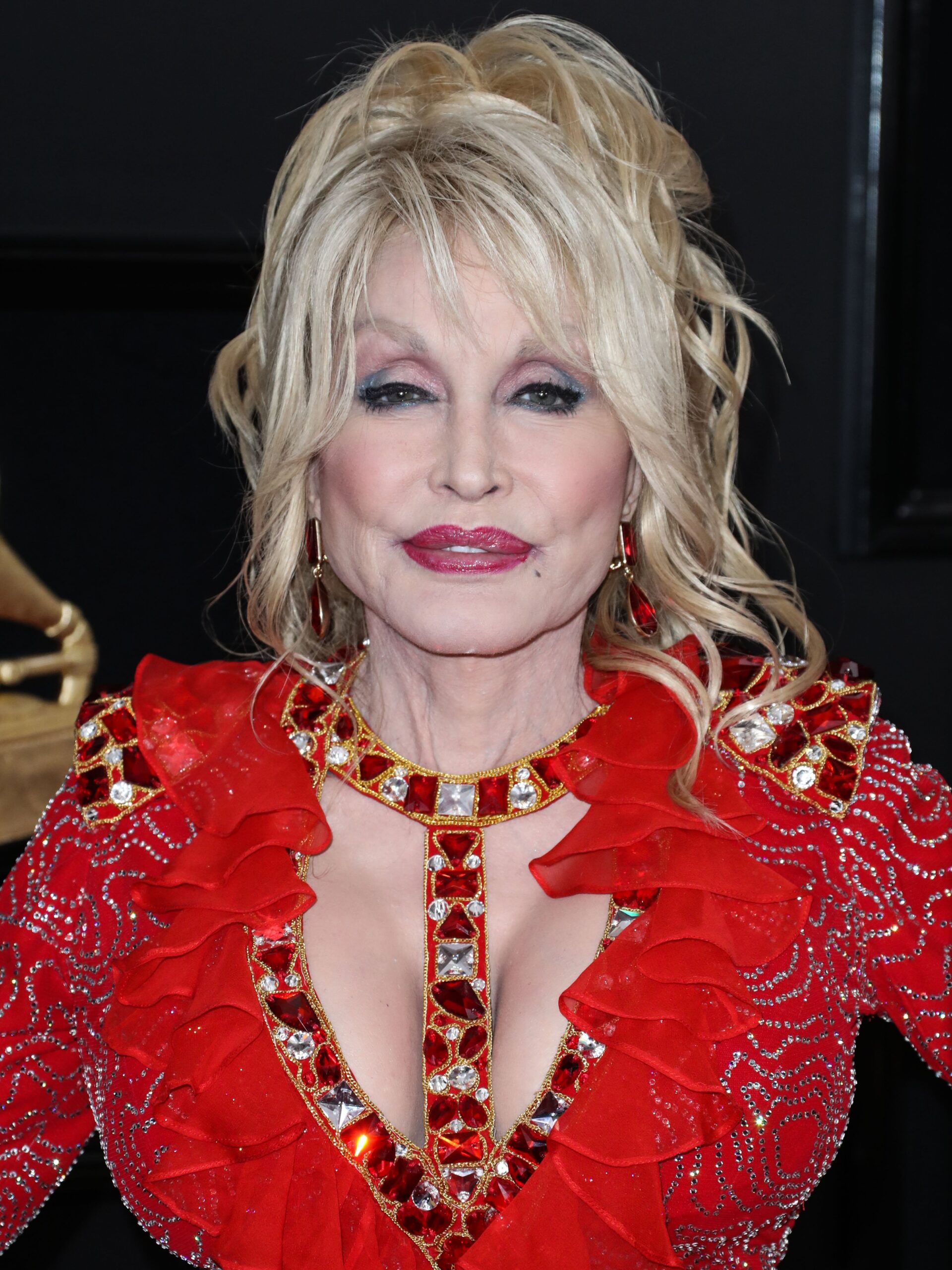 Dolly Parton in red outfit
