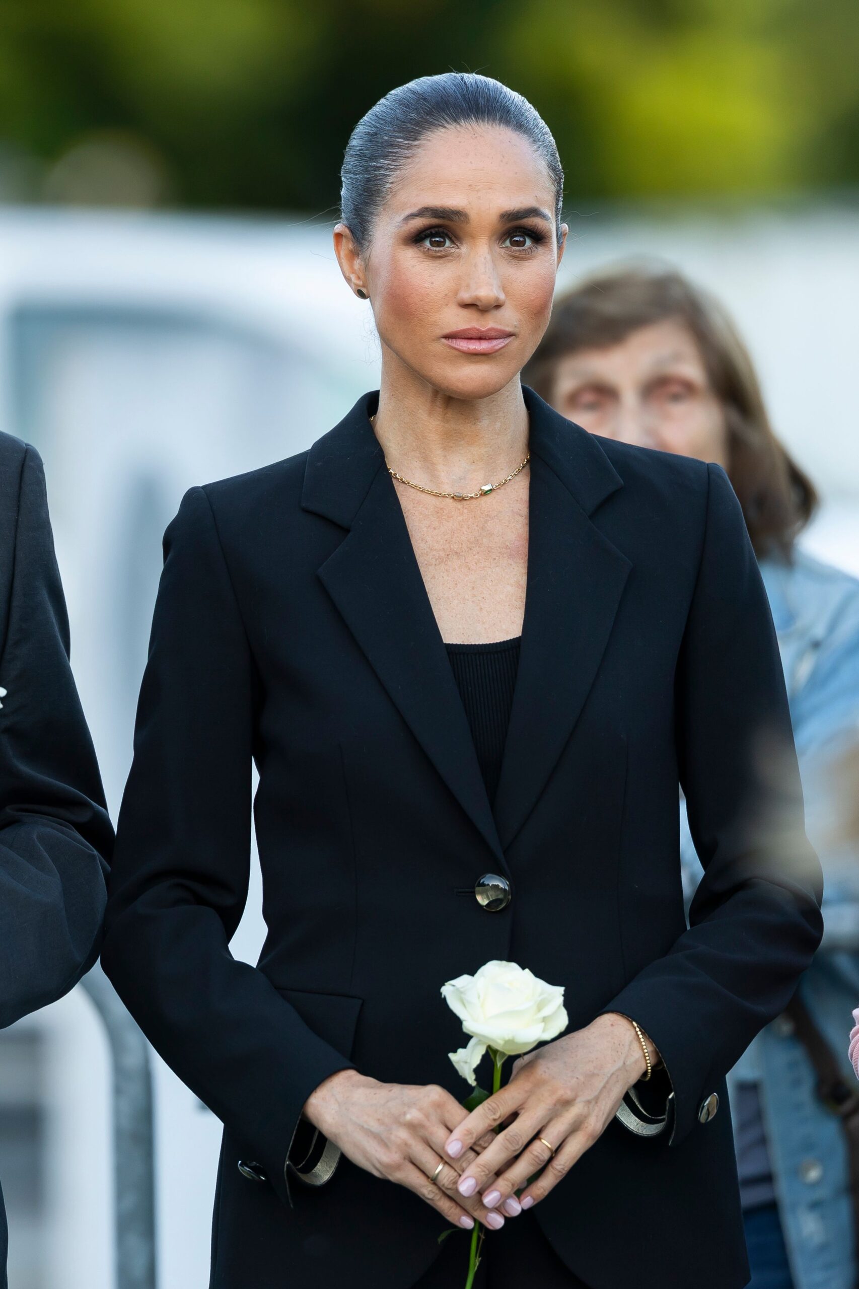 Meghan Markle in a black suit