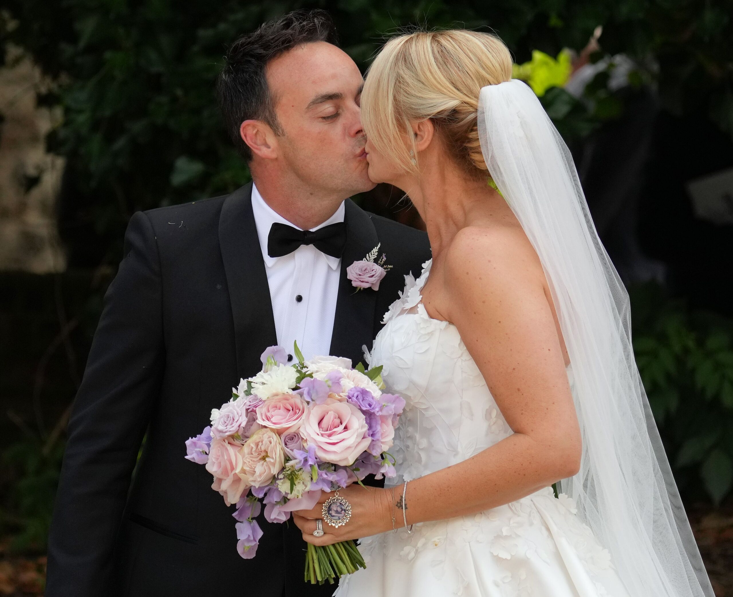 Ant McPartlin and Anne-Marie kissing on wedding day