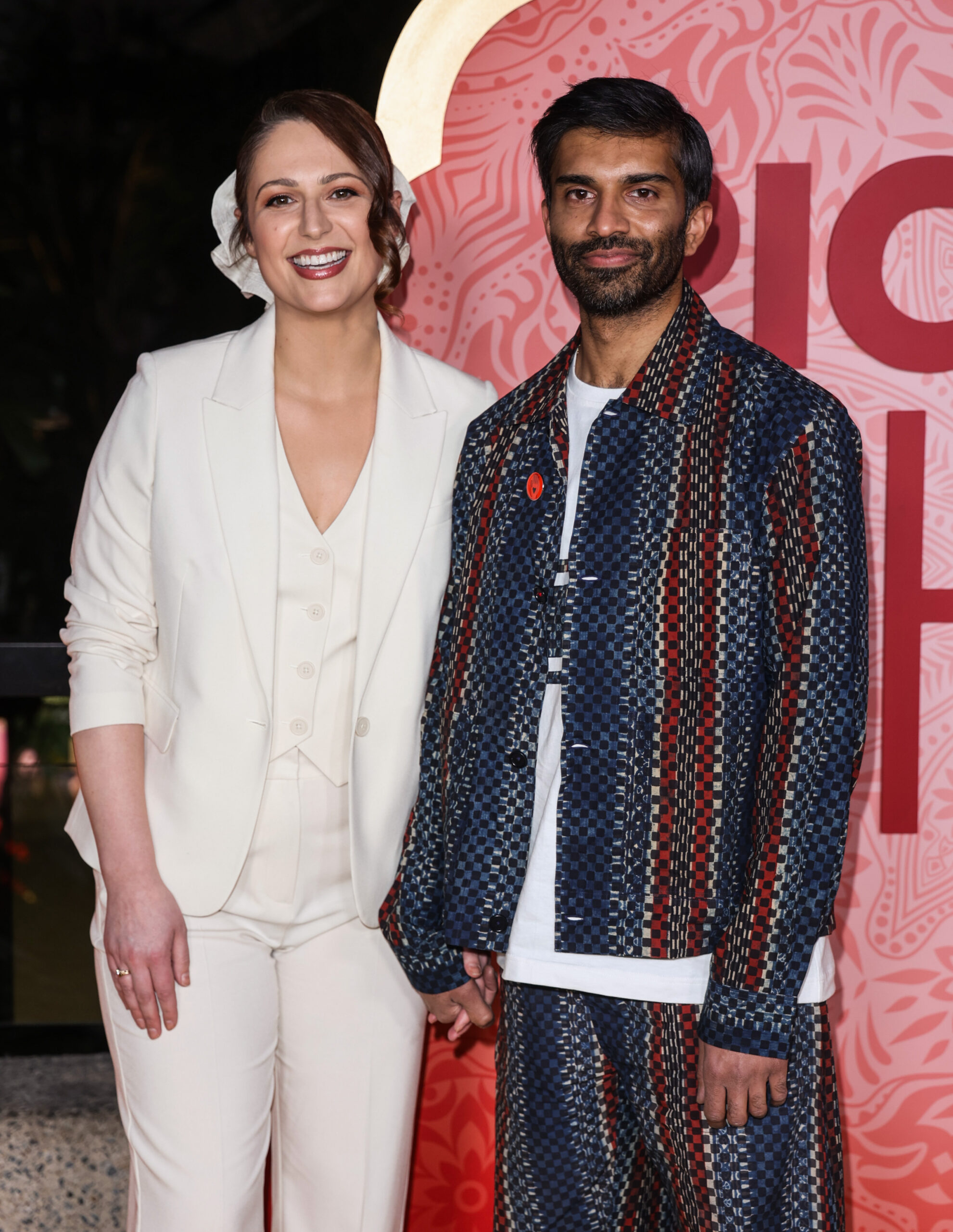 Nicola Thorp and Nikesh Patel smiling at event