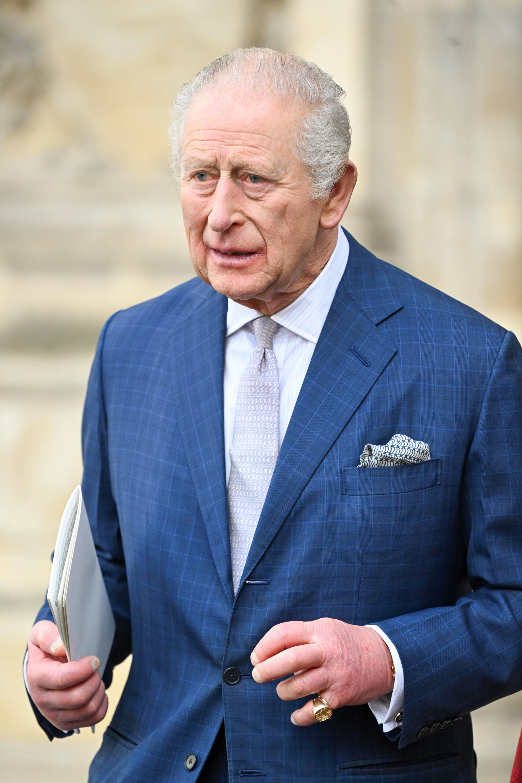 King Charles in blue suit