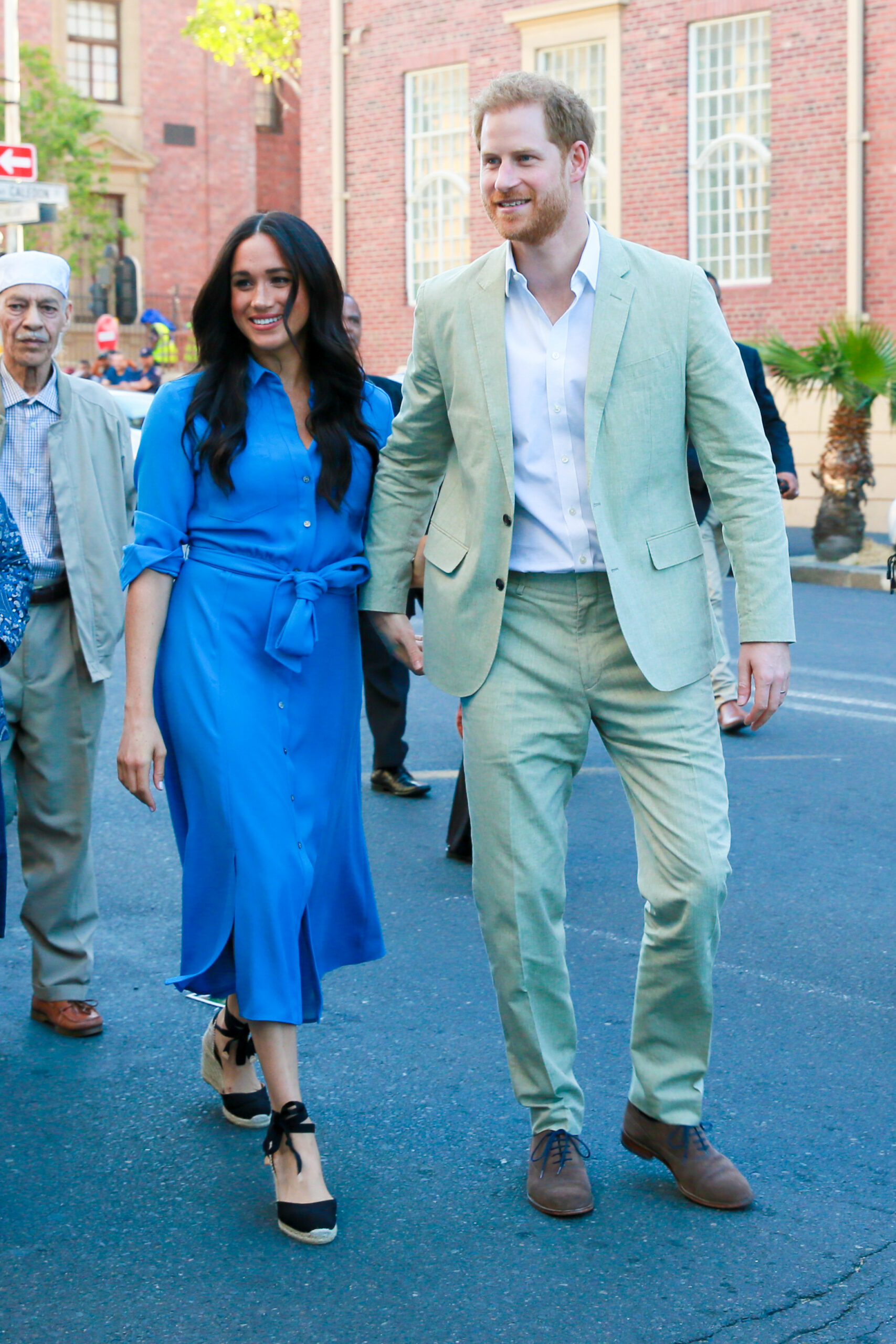 Meghan Markle and Prince Harry smiling on royal engagement