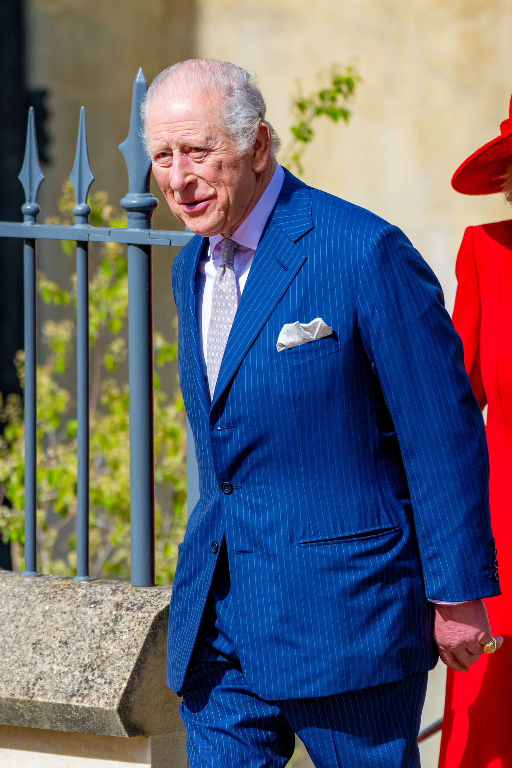 King Charles in blue suit at service