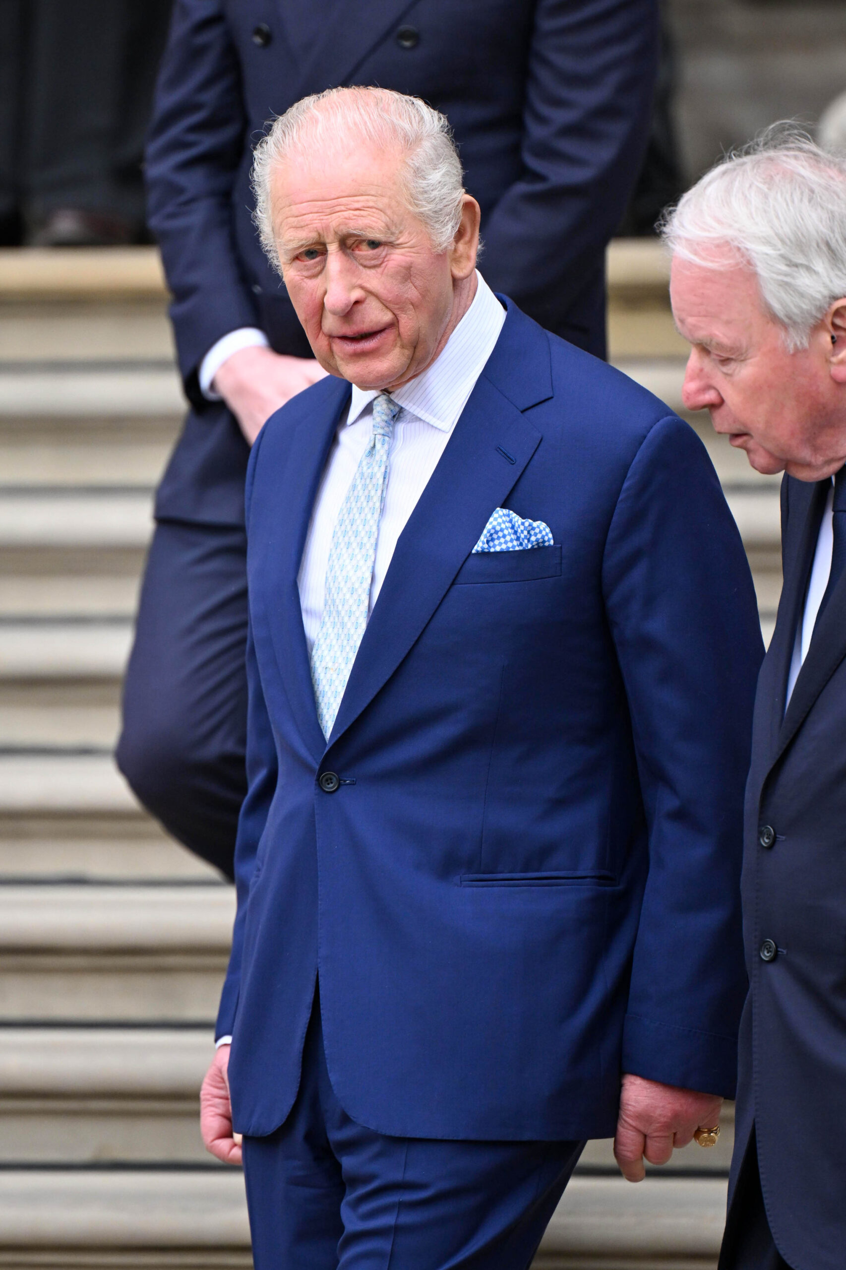 King Charles in blue suit