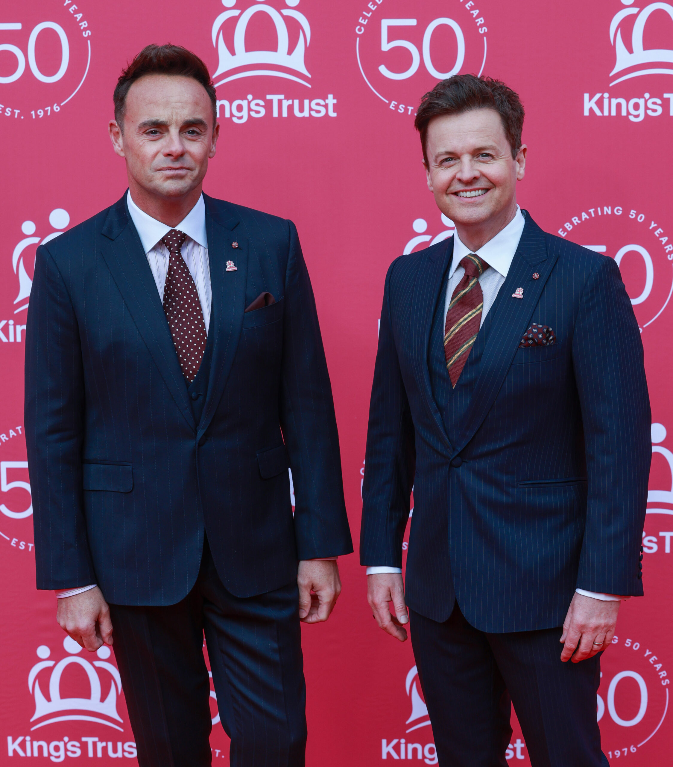 Ant and Dec pose on the red carpet in suits