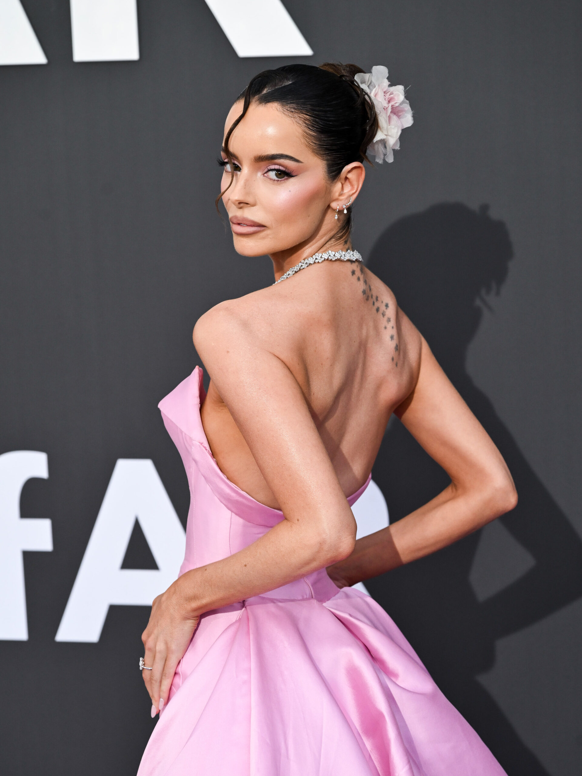Maura Higgins wears pink strapless dress