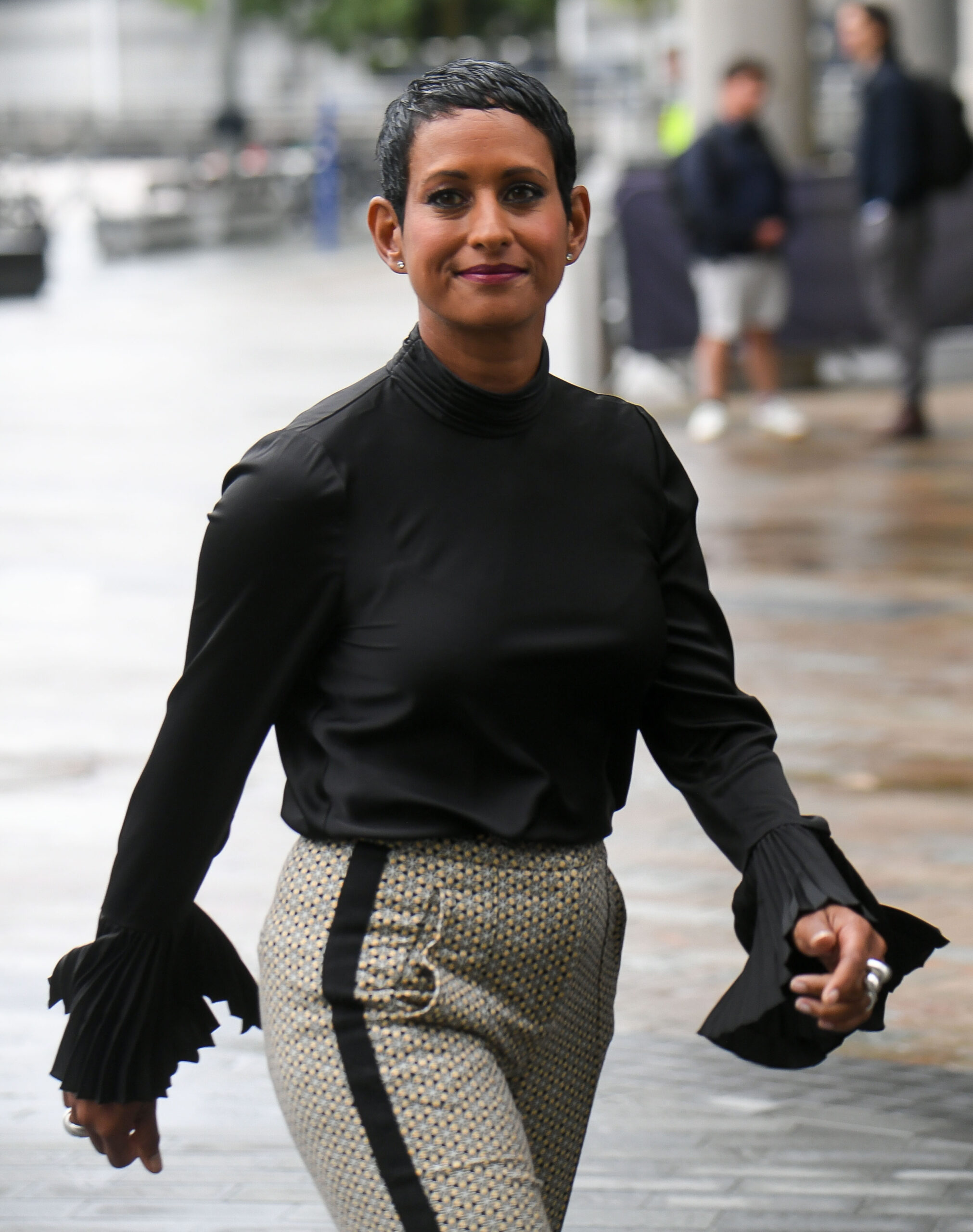 Naga Munchetty wears a black top with fancy sleeves