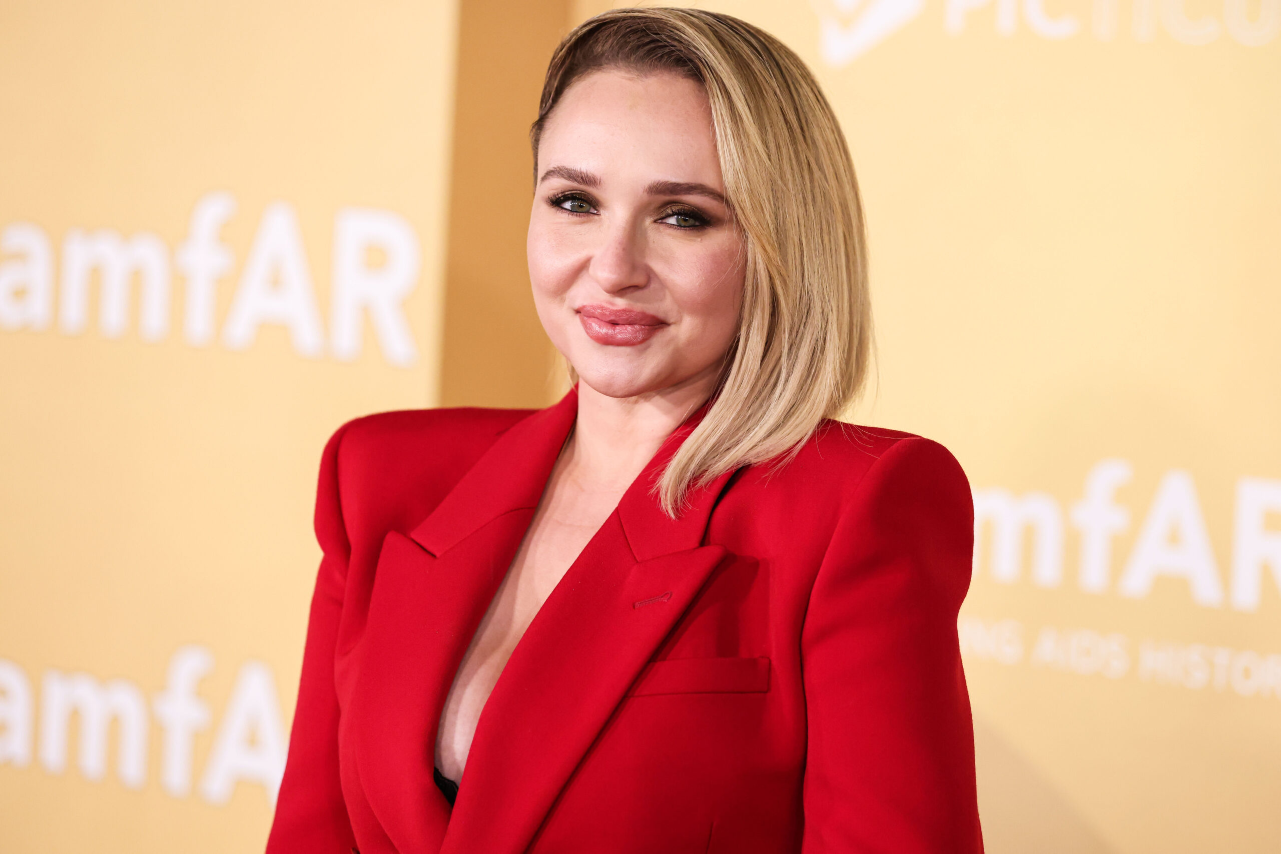 Hayden Panettiere in red outfit at event