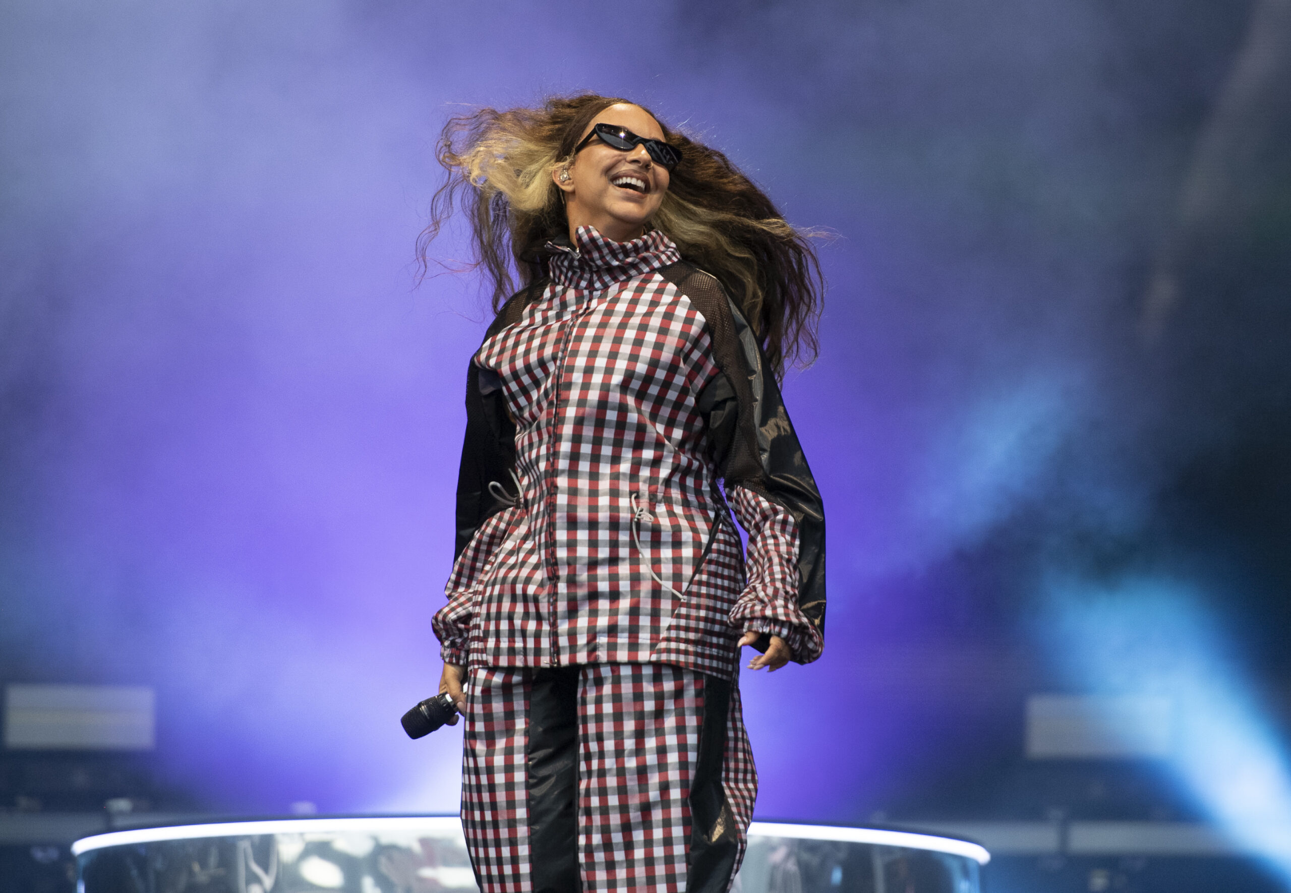 Jade Thirlwall performing on stage