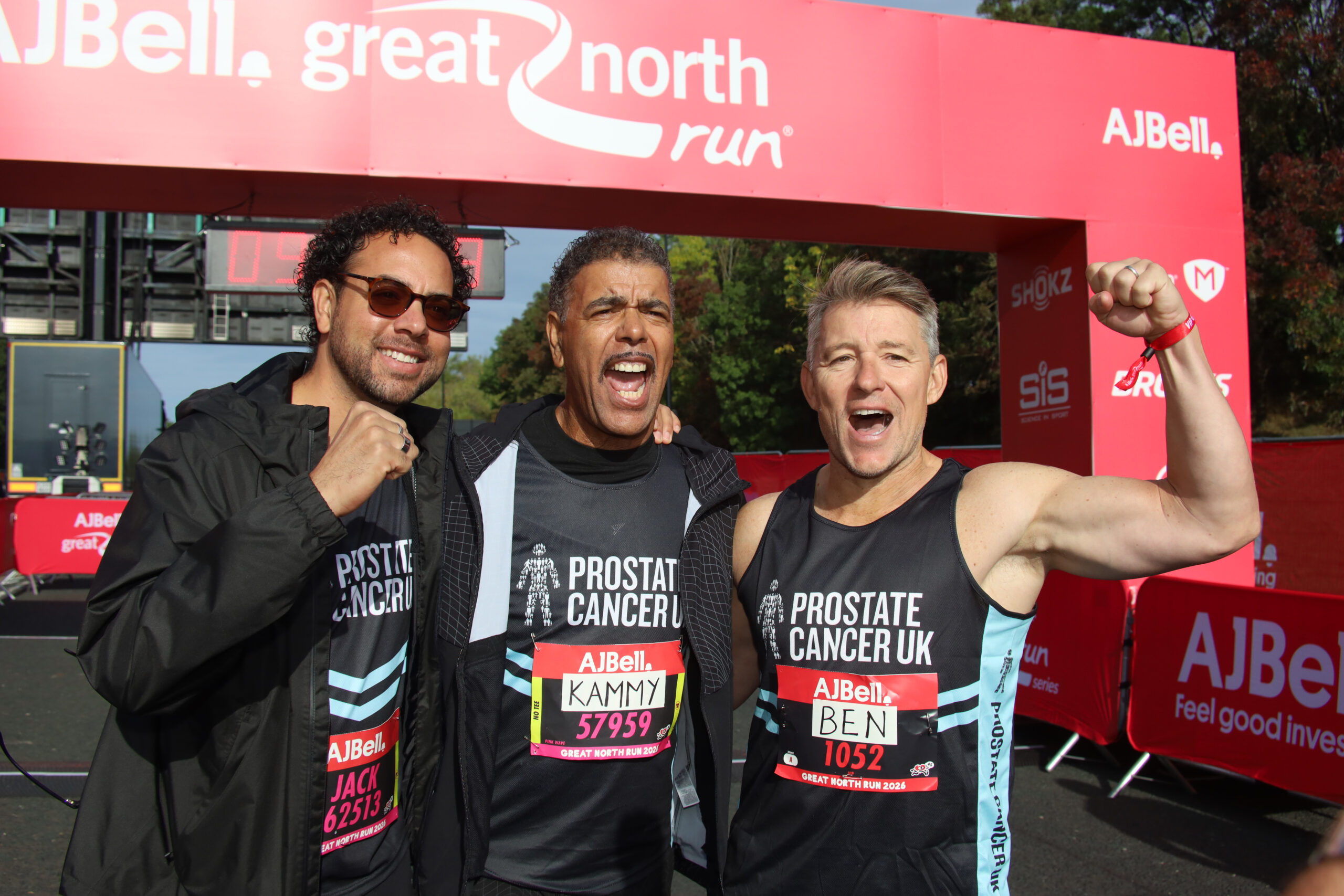 Chris Kamara, his son and Shepherd at the end of their Great North Run