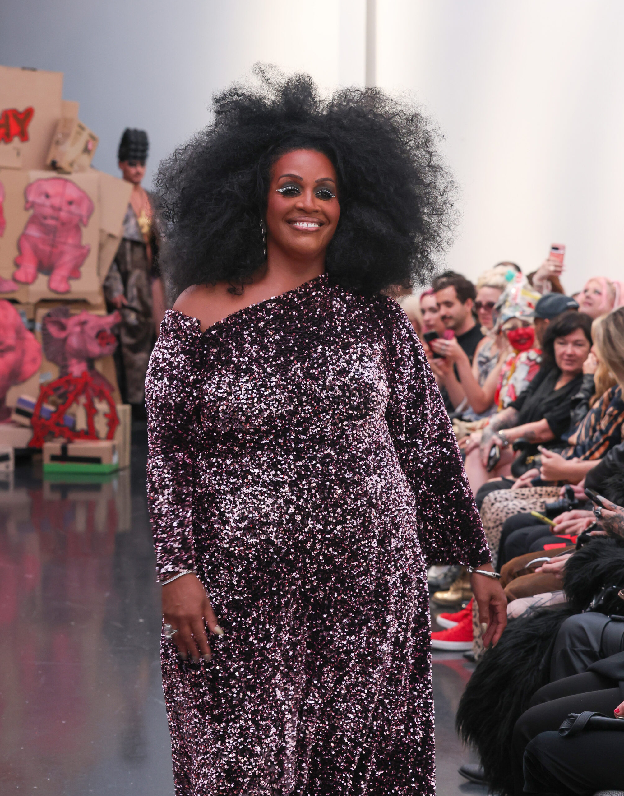 Alison Hammond smiling on the catwalk 