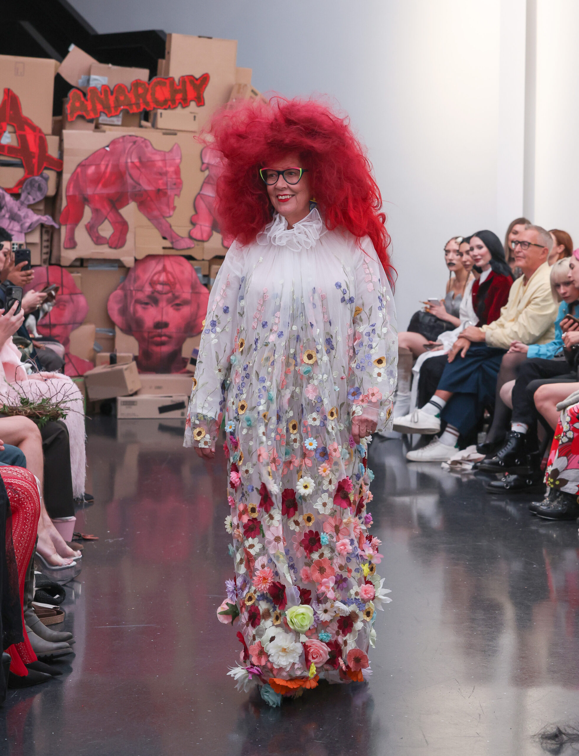 Prue Leith walking on the catwalk  