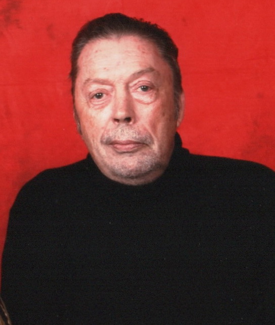 Tim Curry looking in front 