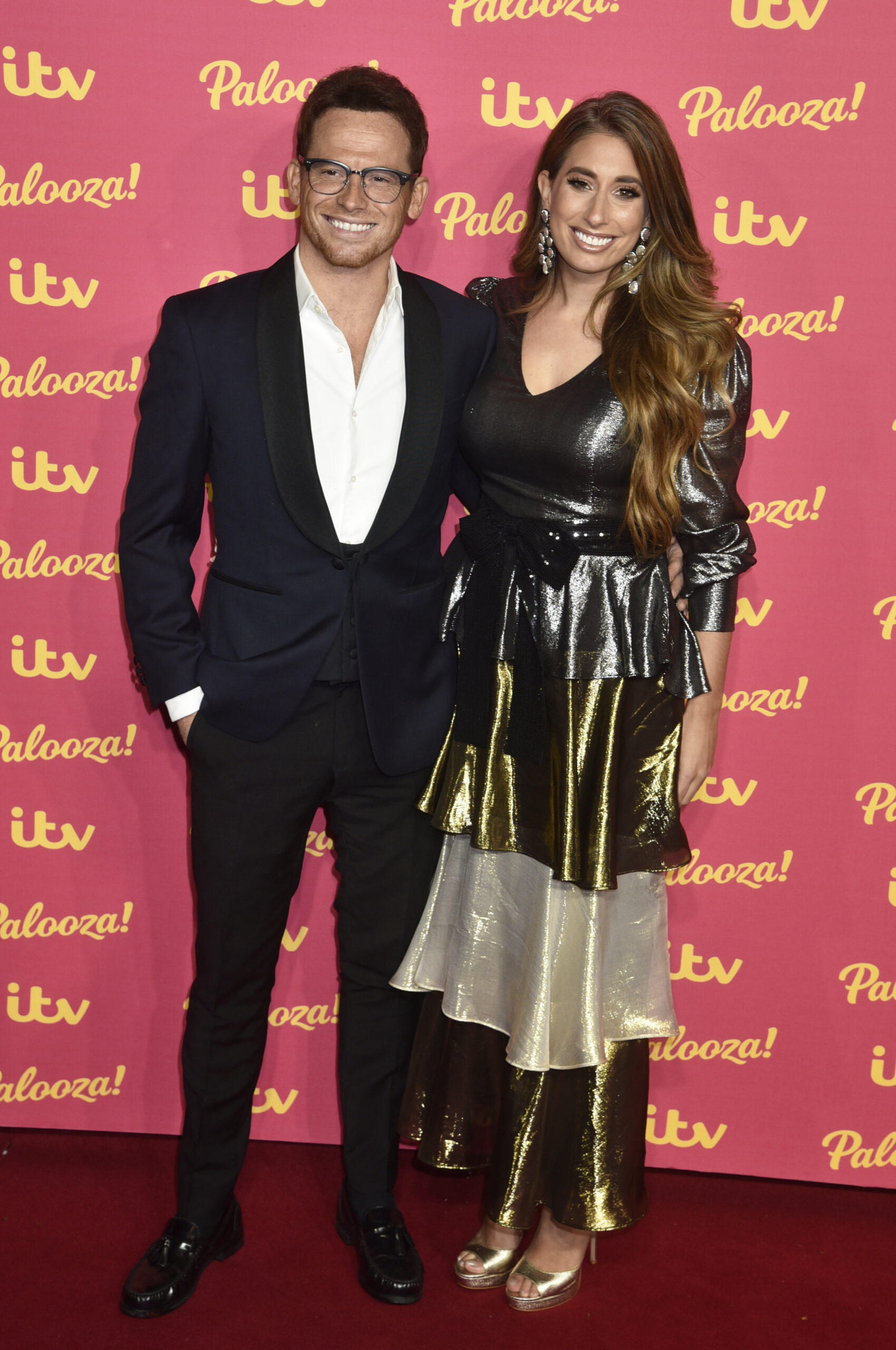 Joe Swash and Stacey Solomon smiling at ITV Palooza