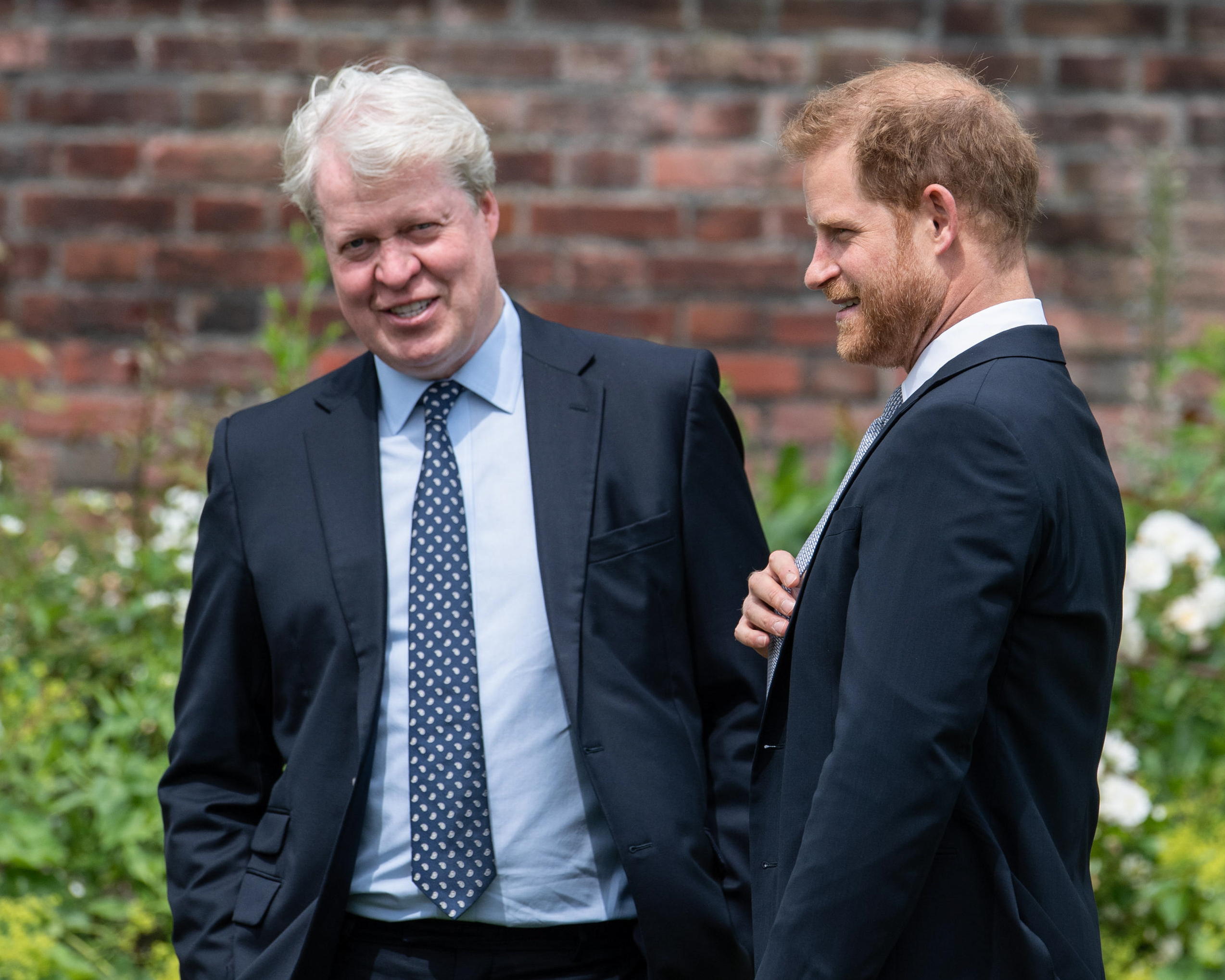 Earl Spencer and Prince Harry at unveiling of Princess Diana statue