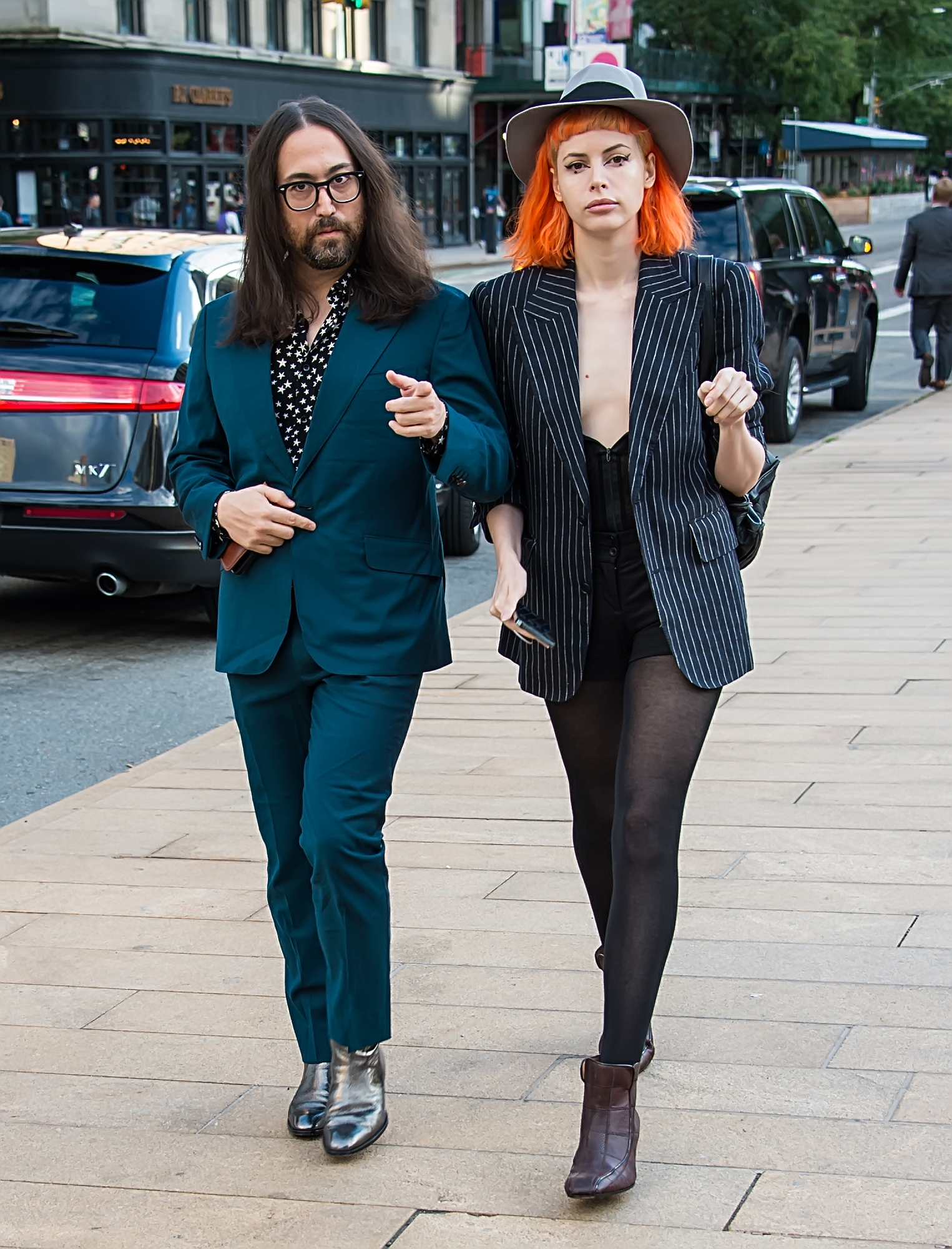 Sean Ono Lennon and Charlotte Kemp Muhl walking 