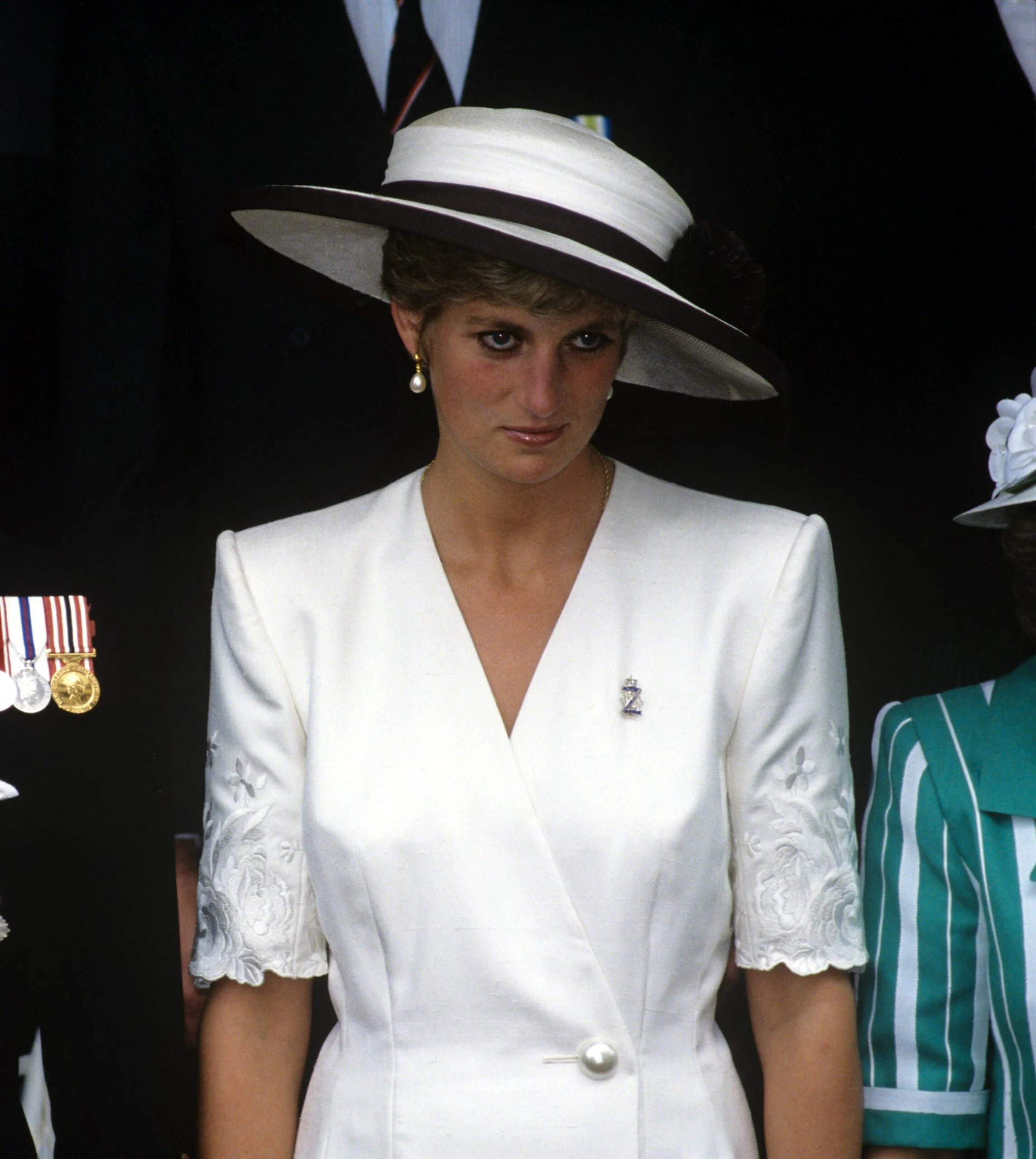 Princess Diana in a white outfit 