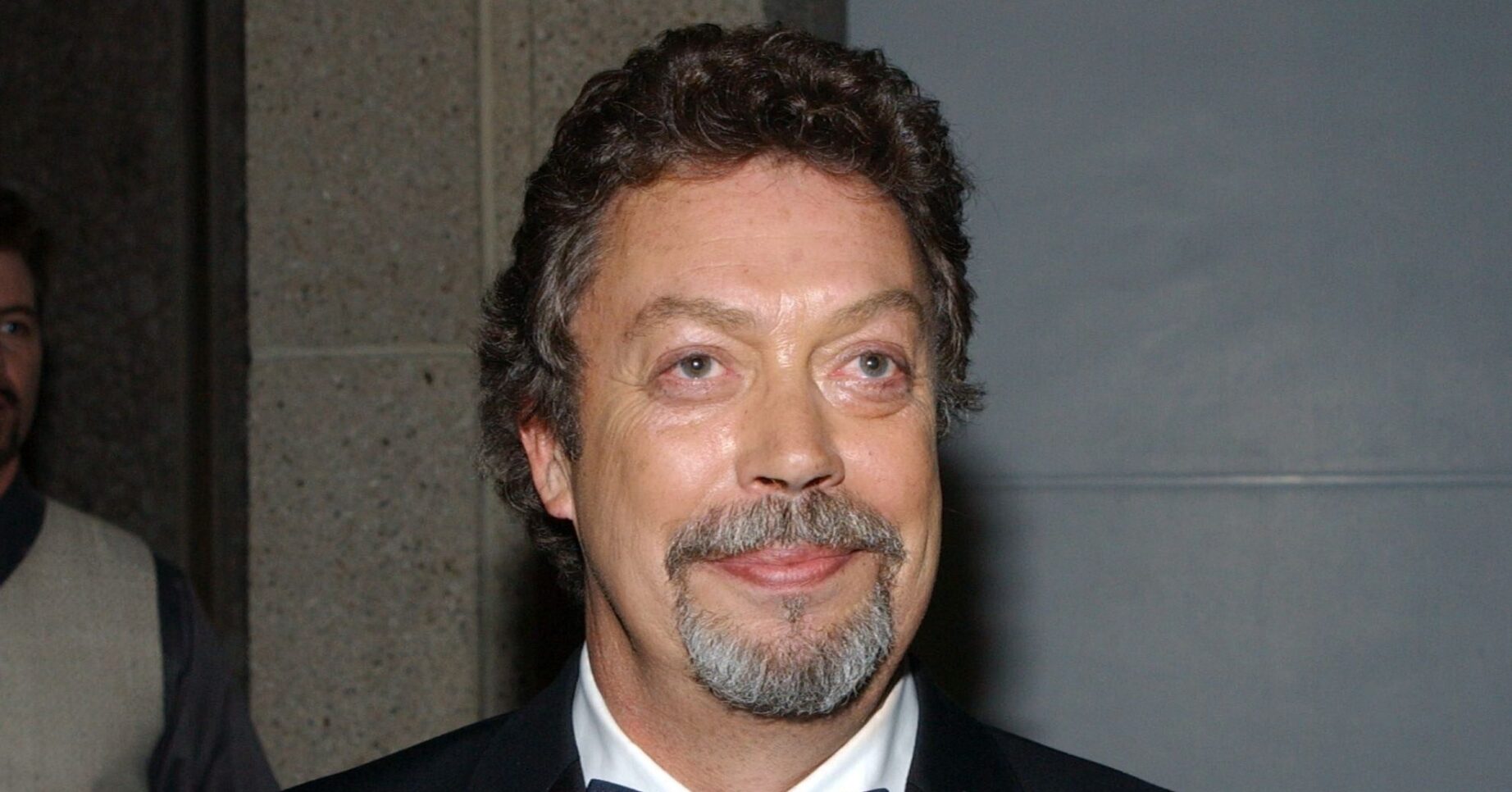 Tim Curry smiling