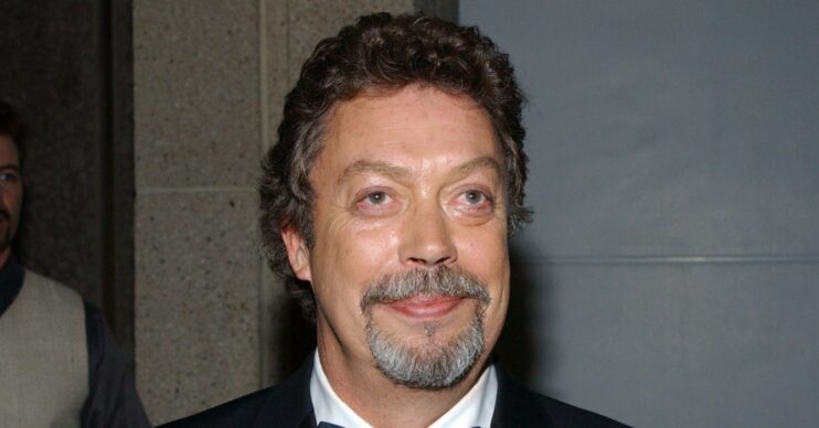 Tim Curry smiling
