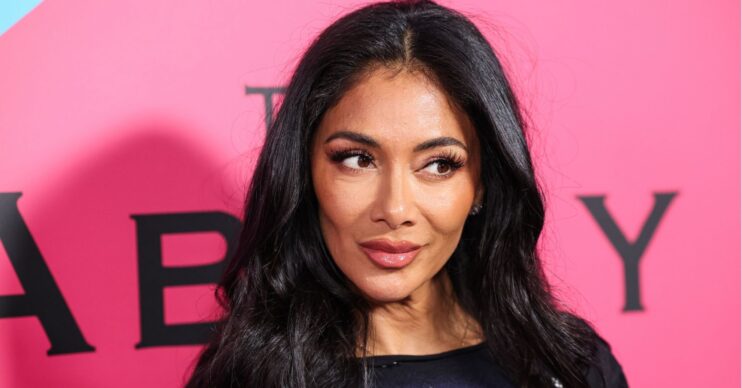 Nicole Scherzinger smirking