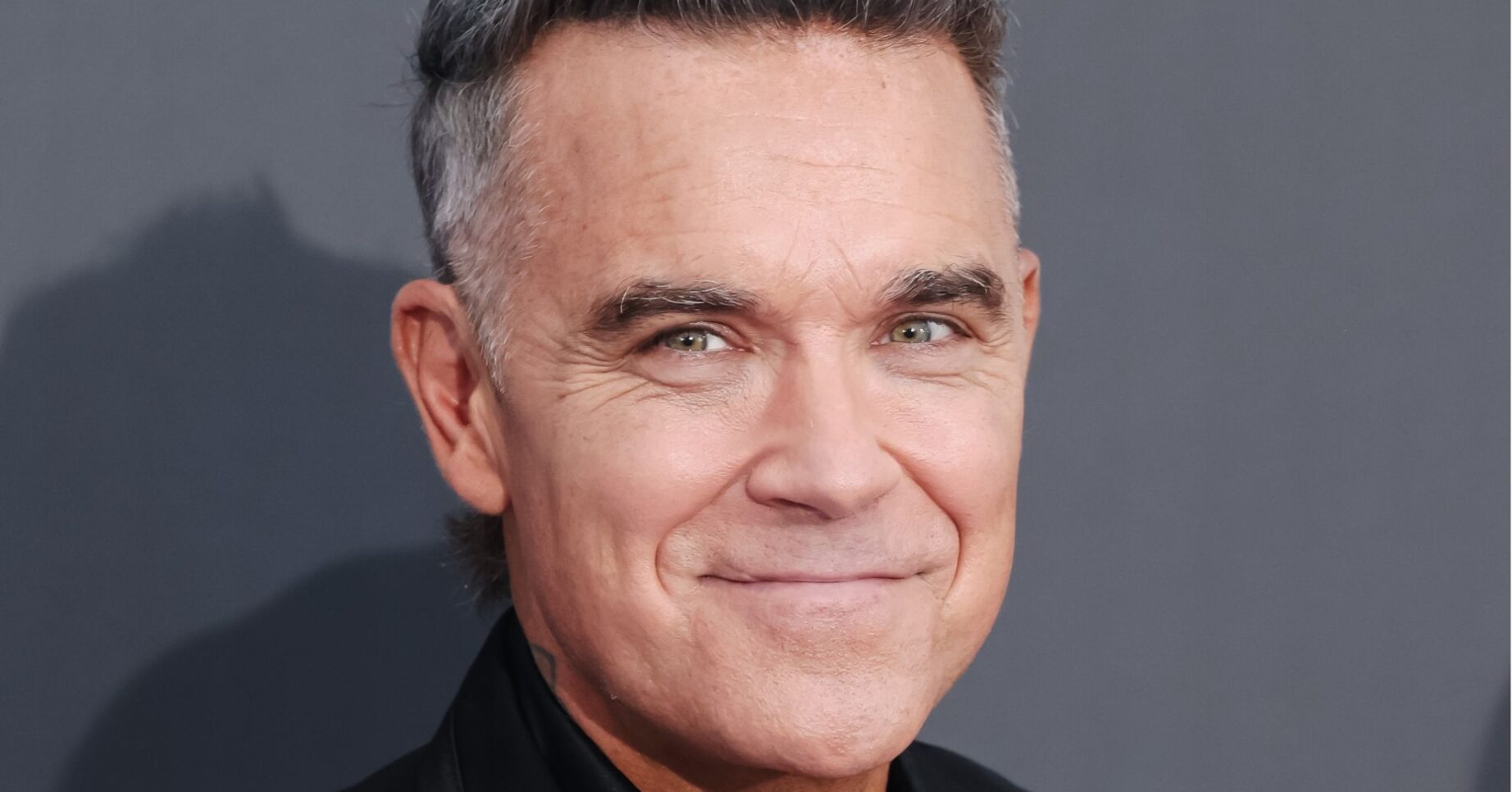 Robbie Williams smiling
