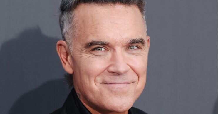 Robbie Williams smiling