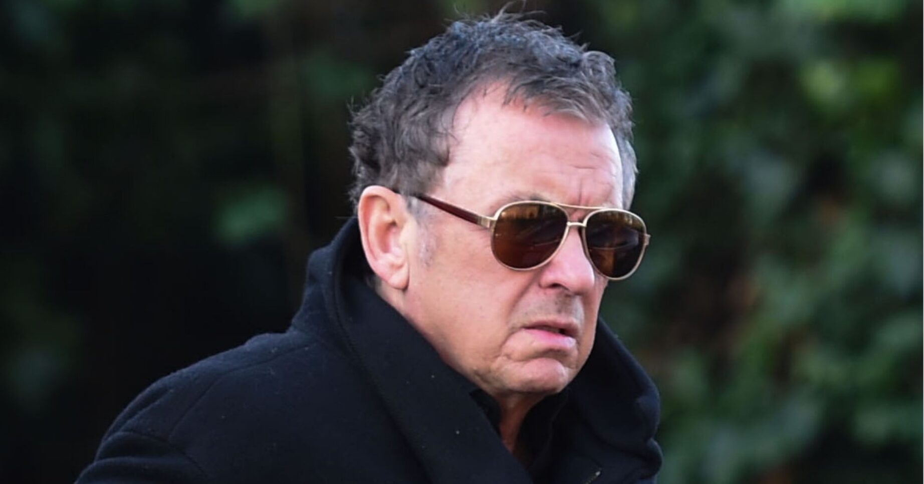 Shane Richie wearing sunglasses