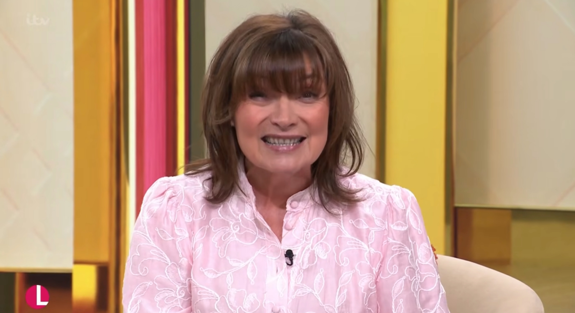 Lorraine Kelly in pink dress on her ITV show