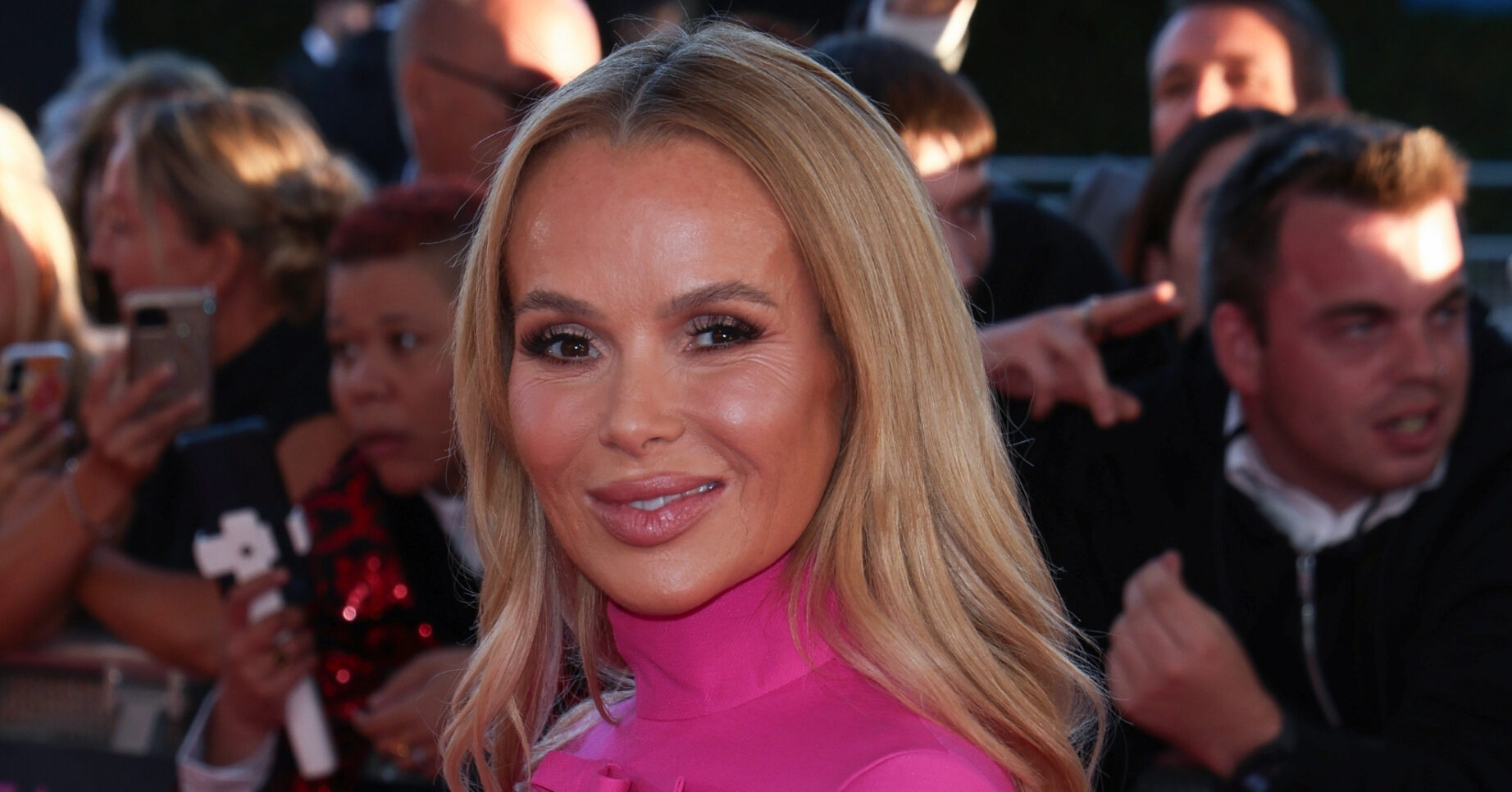 Amanda Holden in pink cut-out dress at NTAs