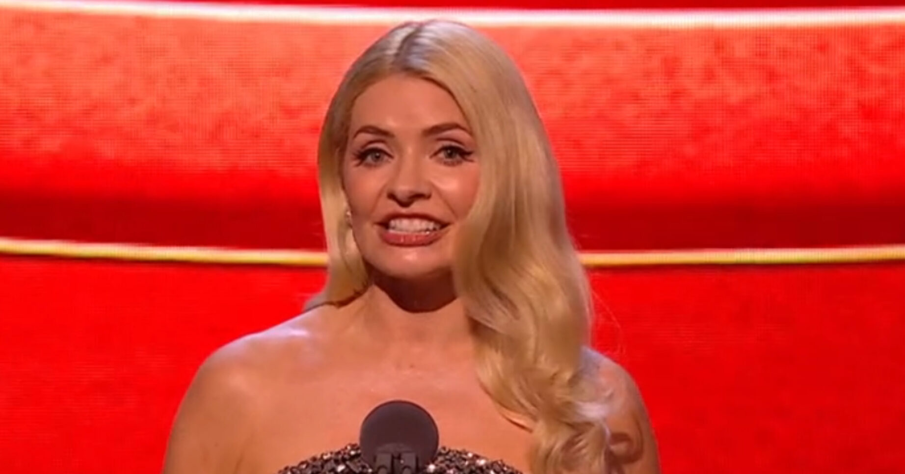 Holly Willoughby presenting award at the NTAs