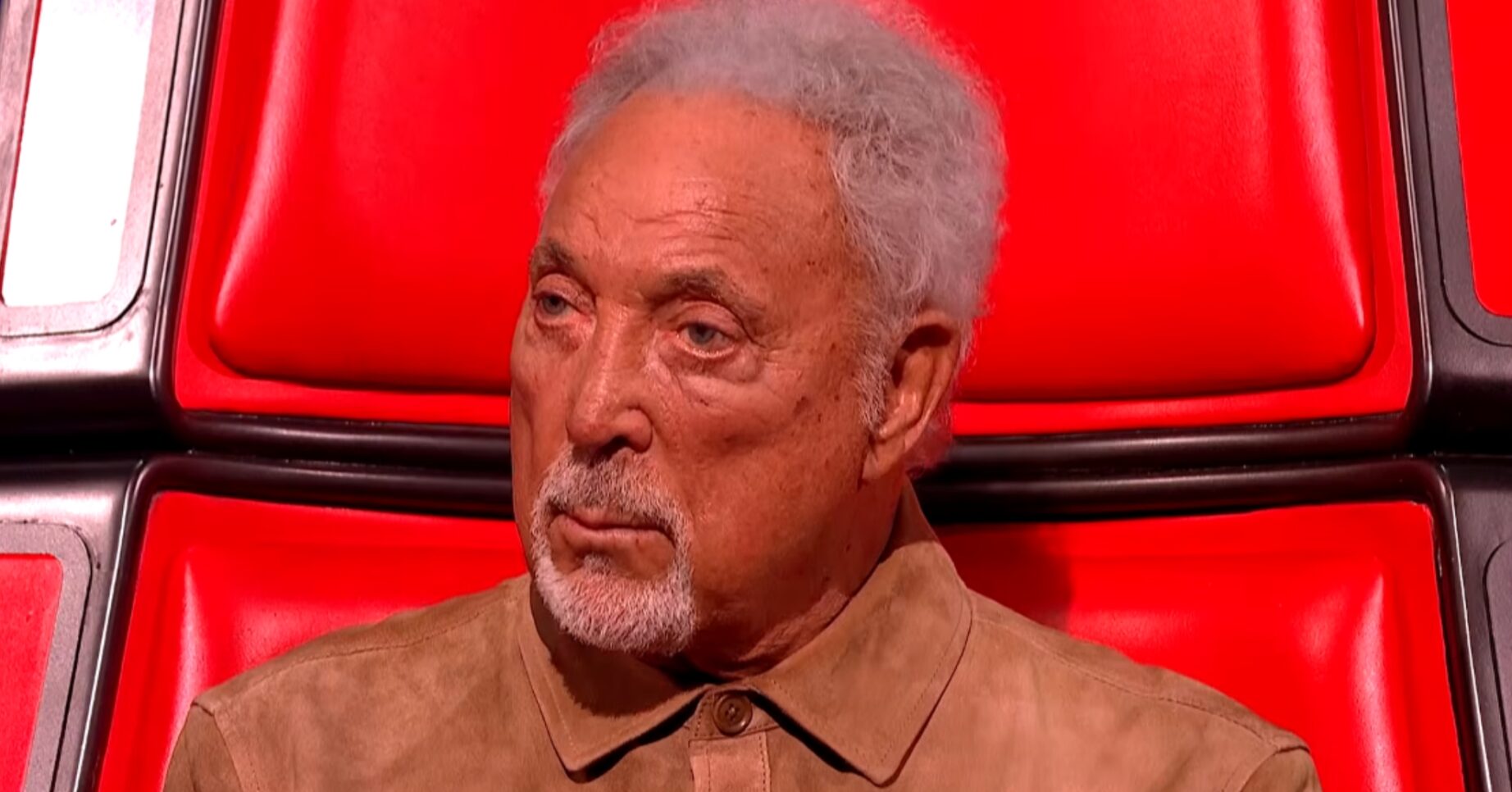 Sir Tom Jones looking serious on The Voice UK