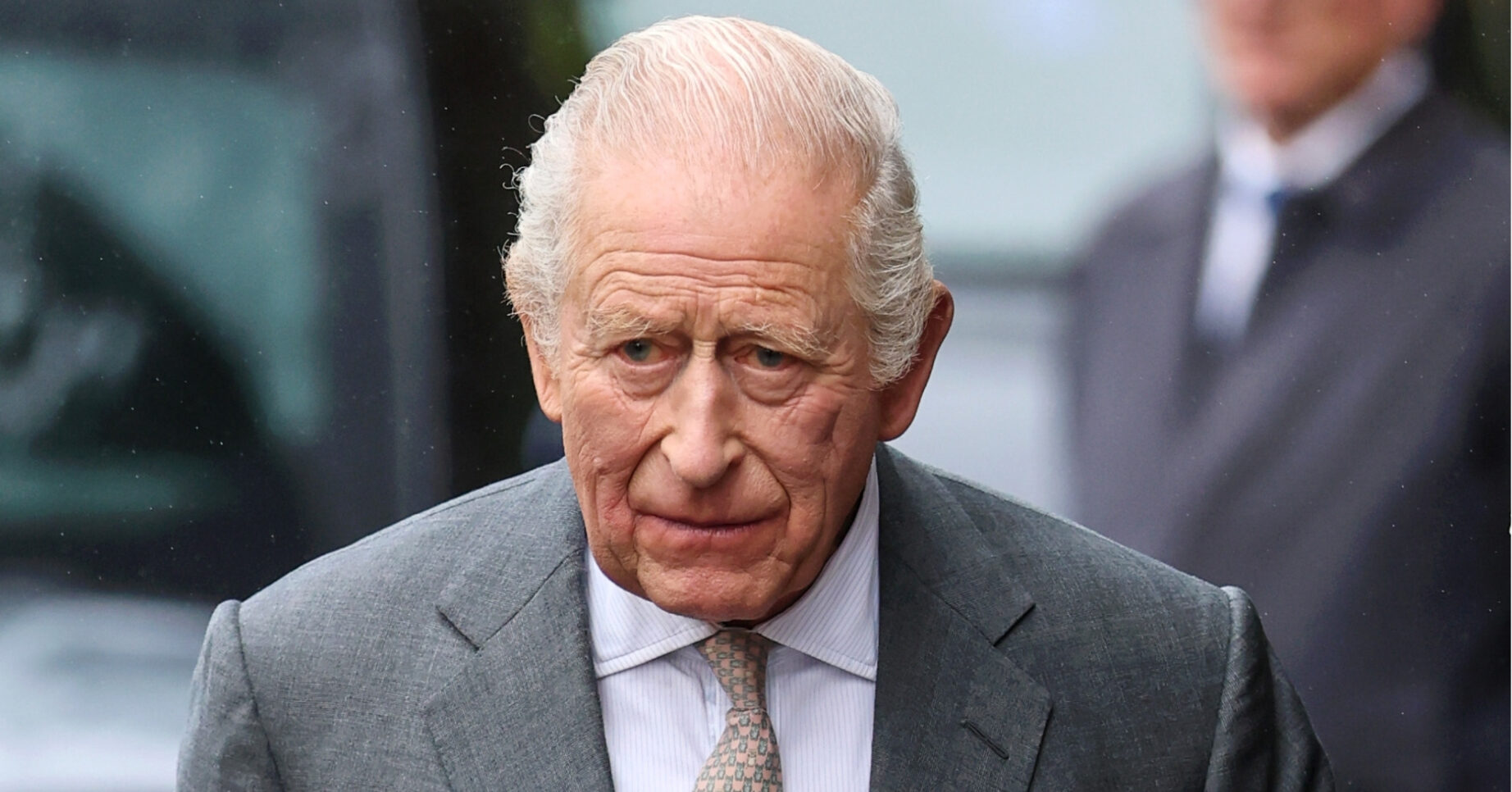 King Charles in grey suit on royal engagement