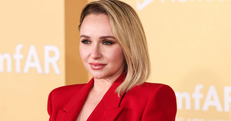Hayden Panettiere in red outfit at event