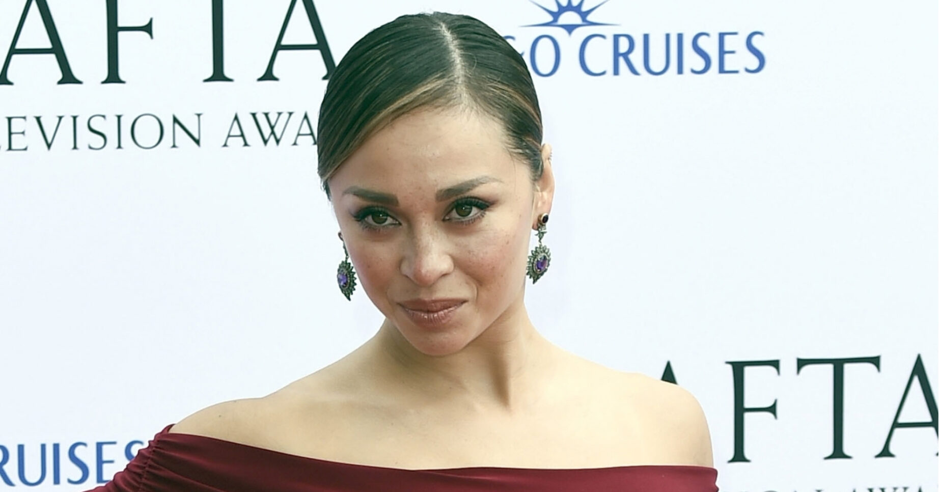 Katya Jones poses on the BAFTA red carpet