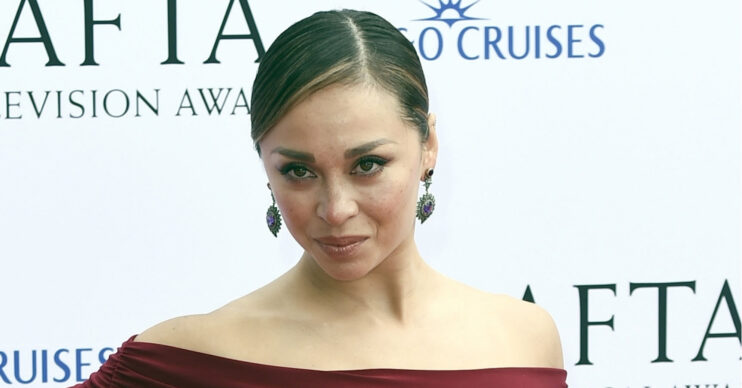 Katya Jones poses on the BAFTA red carpet