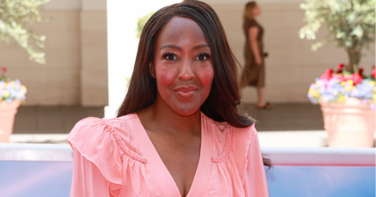 Angellica Bell wears pink dress