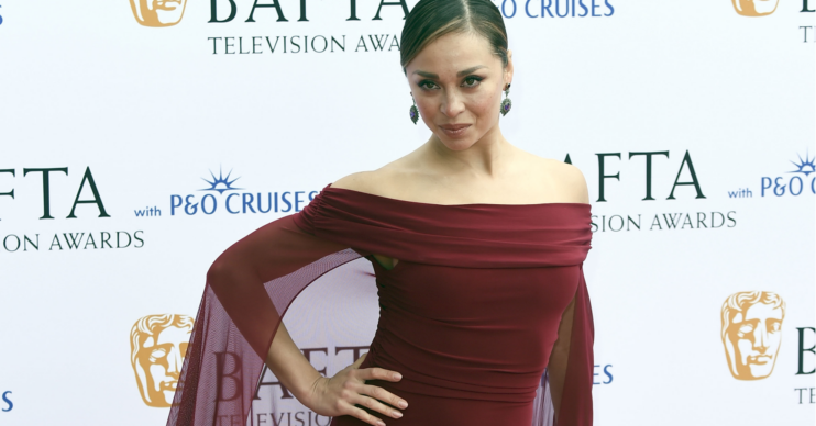 Katya Jones poses on the BAFTA red carpet
